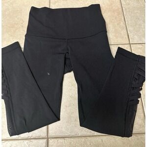 Lululemon High-Waisted Black Leggings with Mesh and Crisscross Detail, Size 4